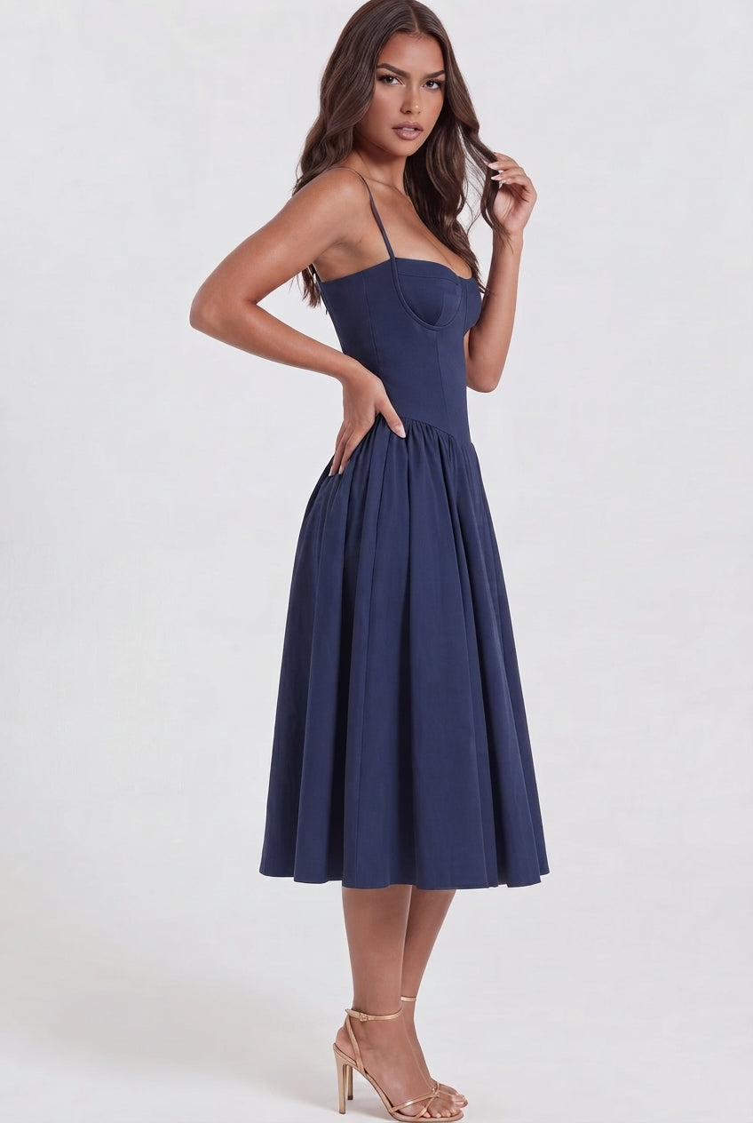 Vestido midi azul marino con escote corazón y bolsillos ocultos